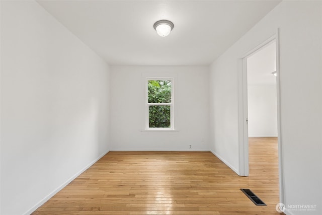 3586 E L St, Tacoma, WA 98404 - unfurnished room featuring light wood-style flooring and baseboards