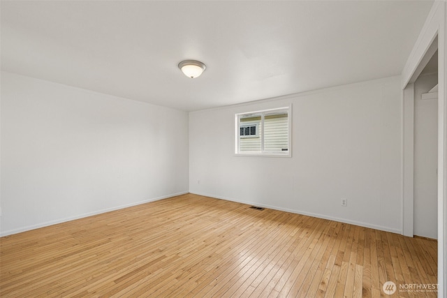 3586 E L St, Tacoma, WA 98404 - unfurnished bedroom with light wood-style flooring and baseboards