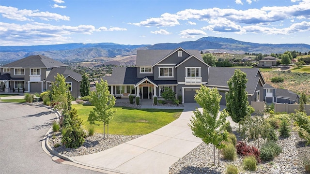 107 Lone Ram Ln, Wenatchee, WA 98801 - view of front of property featuring driveway, a mountain view, and a garage