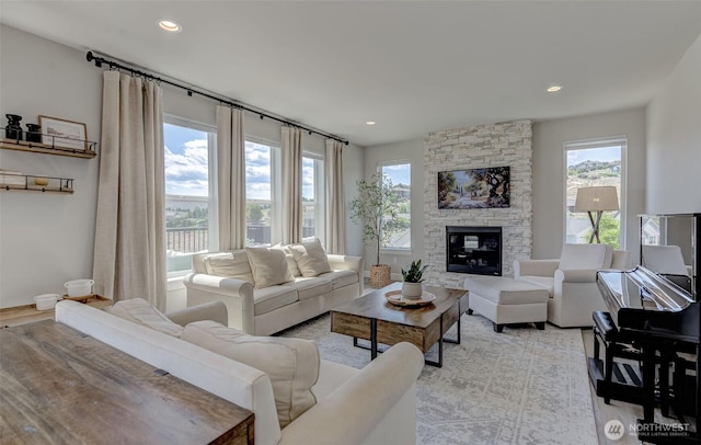 107 Lone Ram Ln, Wenatchee, WA 98801 - living room featuring plenty of natural light, light wood-style floors, recessed lighting, and a stone fireplace