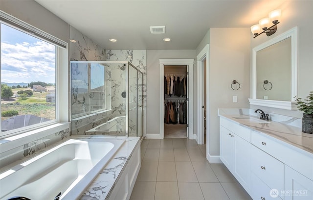 107 Lone Ram Ln, Wenatchee, WA 98801 - bathroom featuring vanity, a marble finish shower, a bath, tile patterned flooring, and recessed lighting