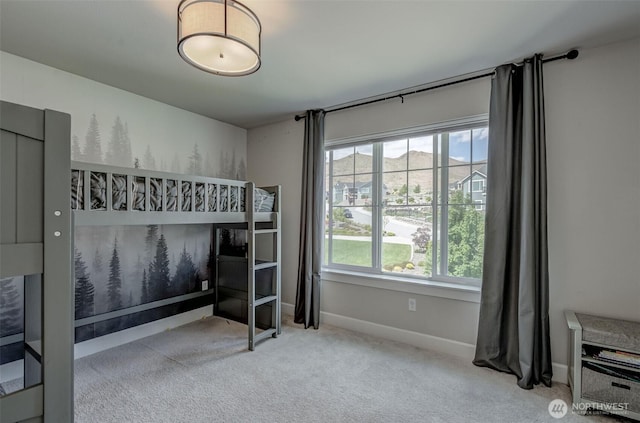 107 Lone Ram Ln, Wenatchee, WA 98801 - bedroom featuring multiple windows, carpet, and baseboards