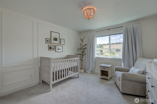 107 Lone Ram Ln, Wenatchee, WA 98801 - bedroom featuring carpet floors, a nursery area, and baseboards