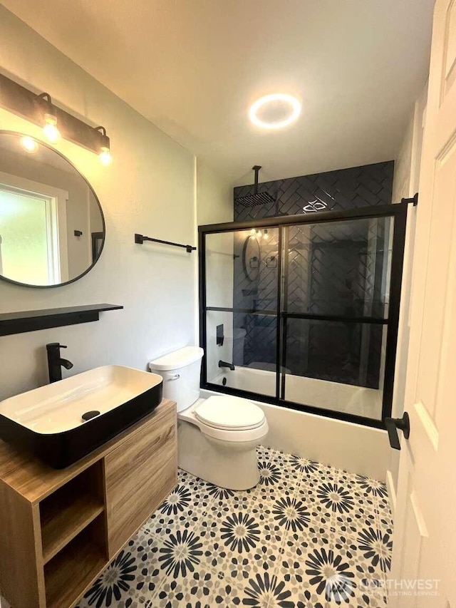 4012 267th St E, Spanaway, WA 98387 - full bathroom featuring a combined bath / shower with rainfall shower, vanity, toilet, and tile patterned floors