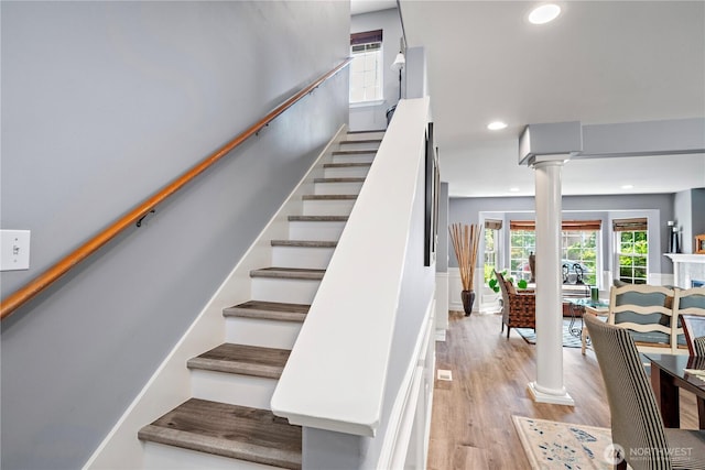 1314 N 182nd Pl, Shoreline, WA 98133 - staircase with decorative columns, wood finished floors, and recessed lighting
