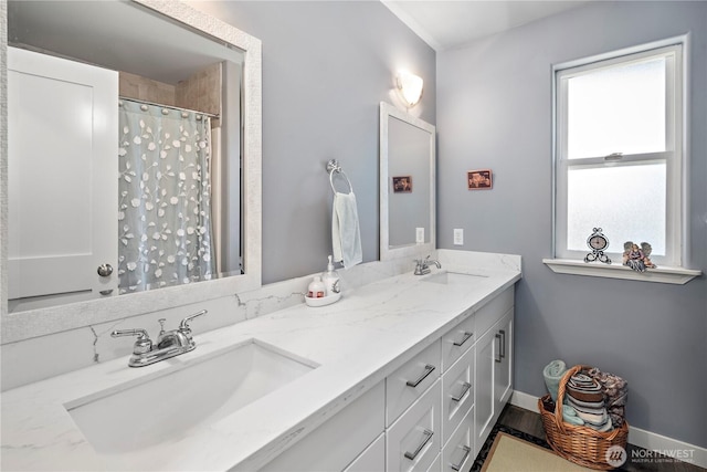 1314 N 182nd Pl, Shoreline, WA 98133 - full bathroom with double vanity, wood finished floors, curtained shower, and baseboards