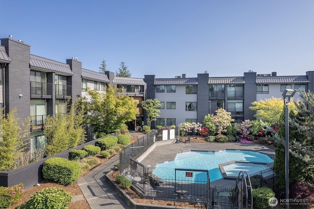 11300 1st Ave NE # 224, Seattle, WA 98125 - view of swimming pool with a pool with connected hot tub