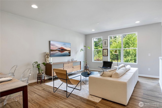 13421 Admiralty Way Unit A-2, Lynnwood, WA 98087 - living area featuring wood finished floors and recessed lighting