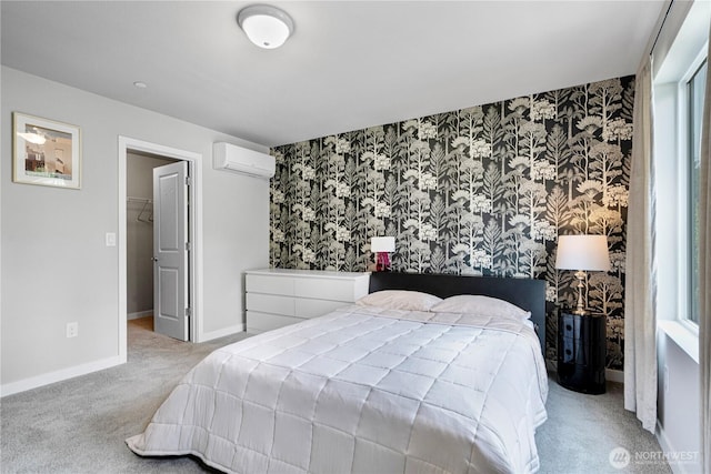 13421 Admiralty Way Unit A-2, Lynnwood, WA 98087 - bedroom with wallpapered walls, an accent wall, carpet floors, an AC wall unit, and a walk in closet