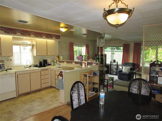 11622 Silver Lake Rd Unit 14, Everett, WA 98208 - kitchen featuring dishwasher, a sink, light countertops, a peninsula, and open floor plan