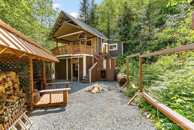 60018 Index Galena Rd, Sultan, WA 98294 - view of outbuilding with an outdoor fire pit and stairs