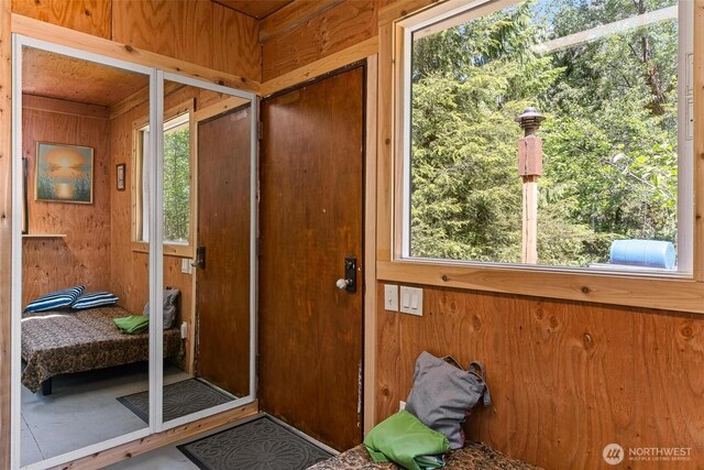 60018 Index Galena Rd, Sultan, WA 98294 - doorway with wooden walls and healthy amount of natural light