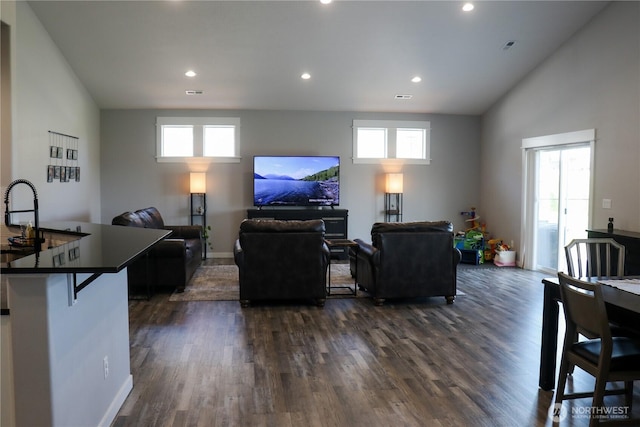 6354 Murray Way NE, Moses Lake, WA 98837 - living area with dark wood finished floors, healthy amount of natural light, recessed lighting, baseboards, and lofted ceiling