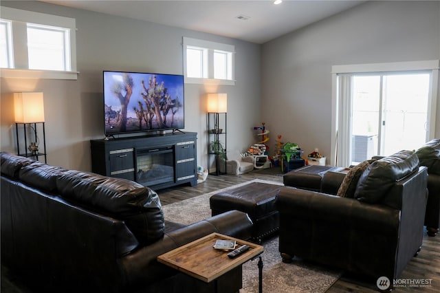 6354 Murray Way NE, Moses Lake, WA 98837 - living room featuring plenty of natural light, wood finished floors, a glass covered fireplace, and recessed lighting