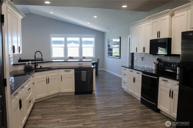6354 Murray Way NE, Moses Lake, WA 98837 - kitchen featuring black appliances, vaulted ceiling, backsplash, dark countertops, and white cabinets
