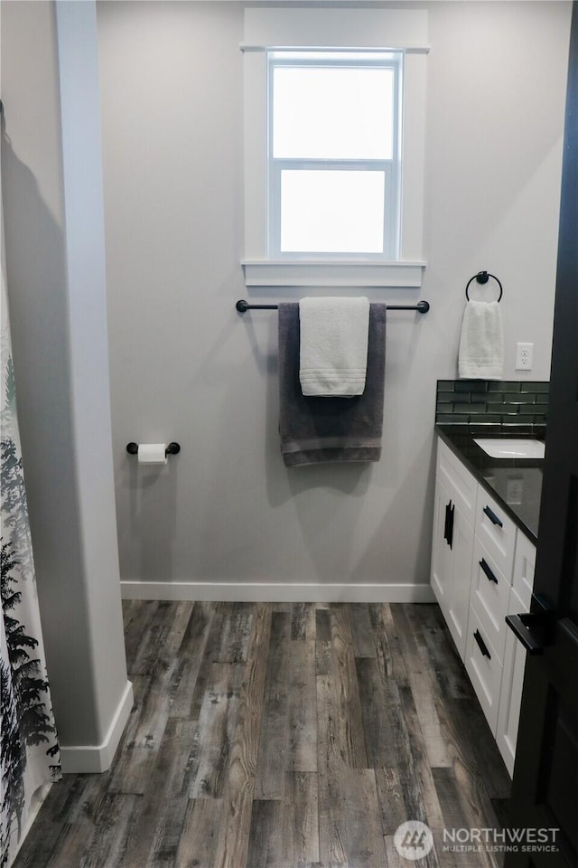 6354 Murray Way NE, Moses Lake, WA 98837 - bathroom featuring vanity, wood finished floors, and baseboards