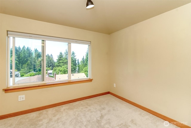 9415 35th Ave SW Unit A, Seattle, WA 98126 - spare room with healthy amount of natural light and carpet flooring