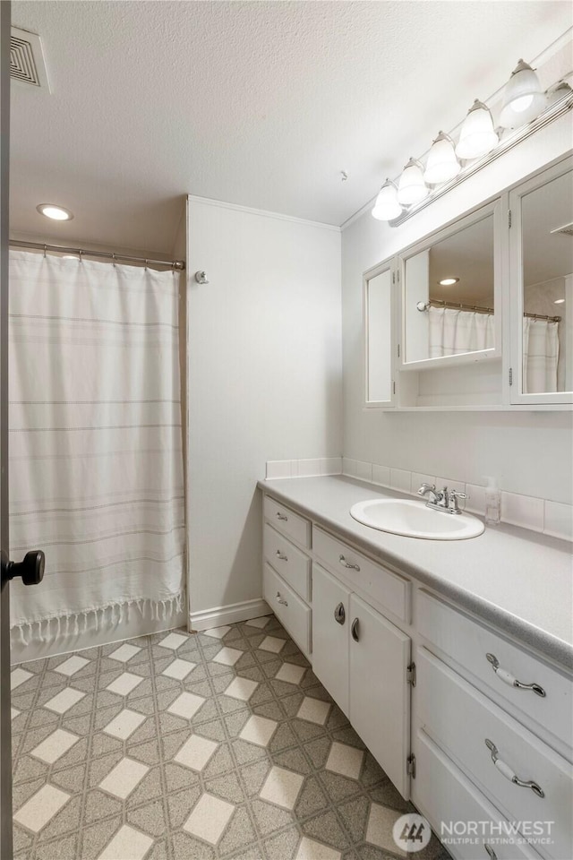 1902 Tellkamp Rd NE, Olympia, WA 98506 - full bathroom with vanity, a textured ceiling, and tile patterned floors