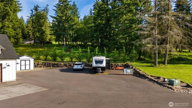 19428 NE 259th St S, Battle Ground, WA 98604 - view of parking / parking lot featuring a storage shed