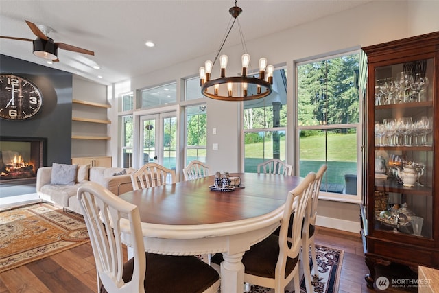 19428 NE 259th St S, Battle Ground, WA 98604 - dining room featuring hardwood / wood-style floors, a ceiling fan, a large fireplace, a chandelier, and recessed lighting