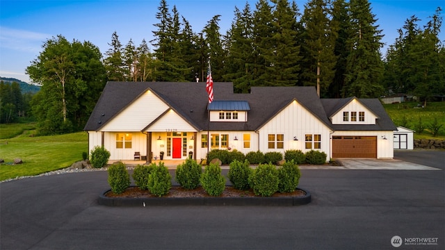 19428 NE 259th St S, Battle Ground, WA 98604 - modern farmhouse style home with board and batten siding, asphalt driveway, a garage, and a front lawn
