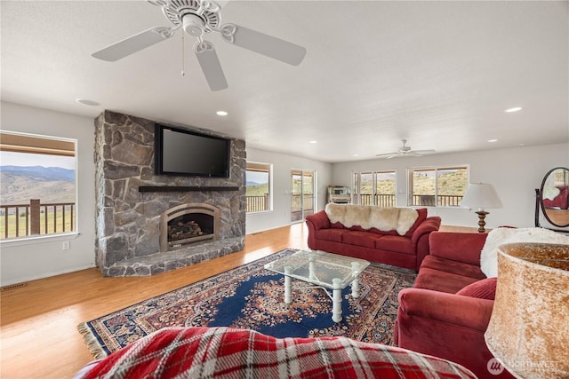 29 Barn Dance Dr, Pateros, WA 98846 - living area with ceiling fan, wood finished floors, plenty of natural light, a fireplace, and recessed lighting