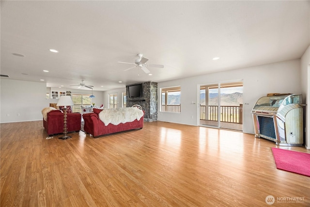 29 Barn Dance Dr, Pateros, WA 98846 - living area with ceiling fan, a fireplace, healthy amount of natural light, light wood-type flooring, and recessed lighting