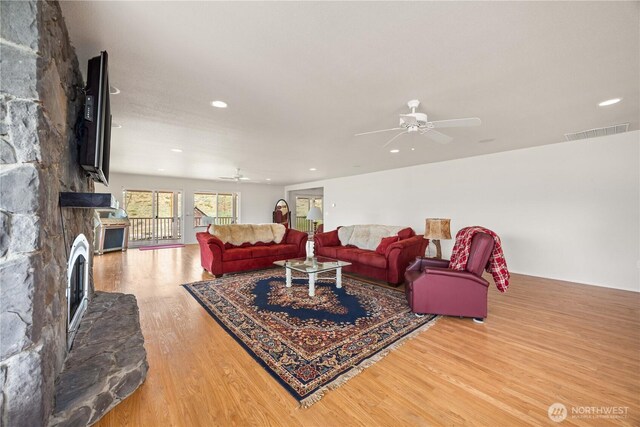 29 Barn Dance Dr, Pateros, WA 98846 - living area featuring a ceiling fan, wood finished floors, a fireplace, and recessed lighting