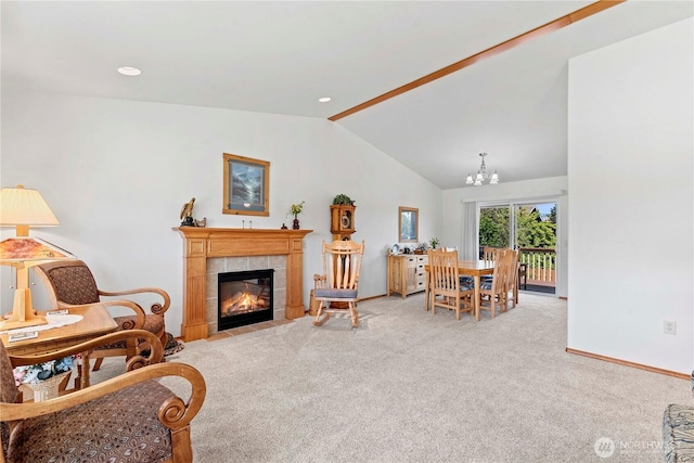 1600 Brandi Ct, Wenatchee, WA 98801 - living area with vaulted ceiling, a chandelier, carpet, baseboards, and a fireplace