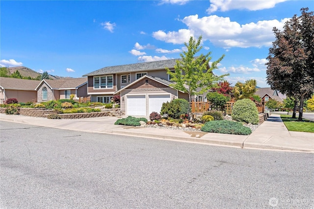 1600 Brandi Ct, Wenatchee, WA 98801 - view of front facade featuring an attached garage and driveway