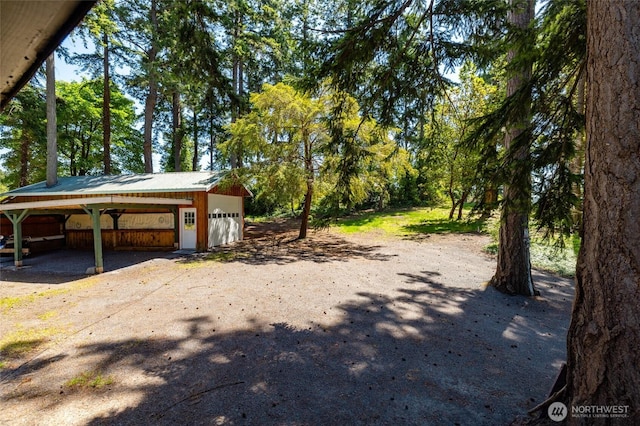 16757 Chilberg Ave, La Conner, WA 98257 - view of yard featuring an outbuilding and a detached garage