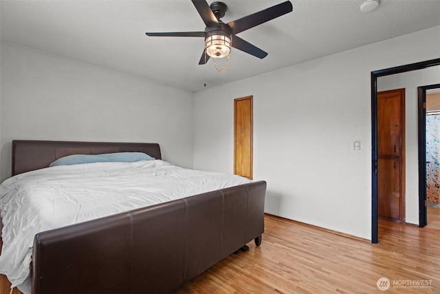1350 S Woodlawn St, Tacoma, WA 98465 - bedroom featuring light wood-style flooring and ceiling fan