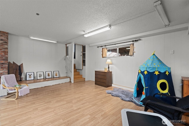 1350 S Woodlawn St, Tacoma, WA 98465 - interior space with a textured ceiling, wood finished floors, and stairs