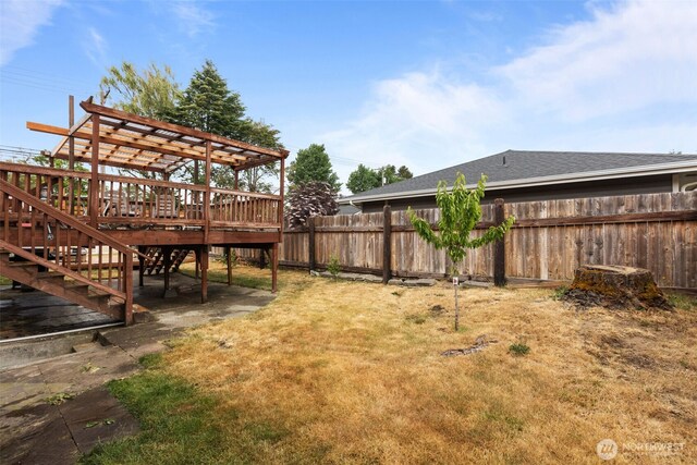 1350 S Woodlawn St, Tacoma, WA 98465 - view of yard featuring a deck and stairway