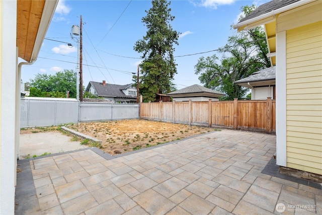 506 Douglas St, Wenatchee, WA 98801 - fenced backyard with a patio area