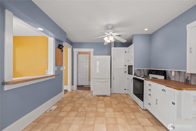 506 Douglas St, Wenatchee, WA 98801 - kitchen with white appliances, white cabinets, a ceiling fan, baseboards, and recessed lighting
