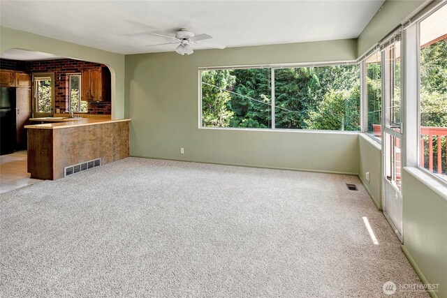 17004 16th Ave SW, Normandy Park, WA 98166 - unfurnished sunroom with arched walkways and a sink