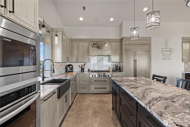 111 Wren Loop SW, Mattawa, WA 99349 - kitchen with stainless steel appliances, plenty of natural light, light stone counters, and recessed lighting