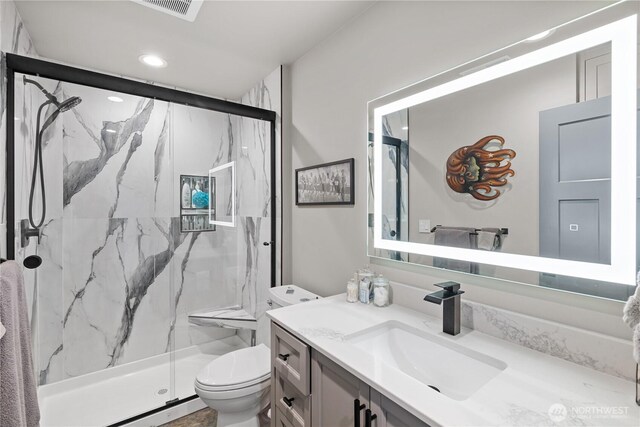 111 Wren Loop SW, Mattawa, WA 99349 - bathroom with a marble finish shower, vanity, and recessed lighting