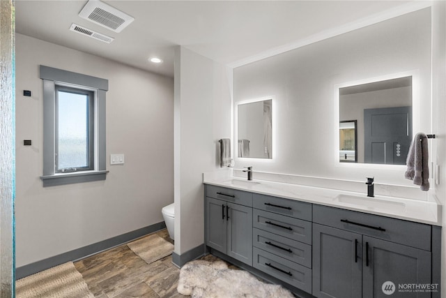 111 Wren Loop SW, Mattawa, WA 99349 - bathroom with double vanity, wood finished floors, and recessed lighting