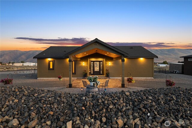 111 Wren Loop SW, Mattawa, WA 99349 - view of front of property with a mountain view and stucco siding