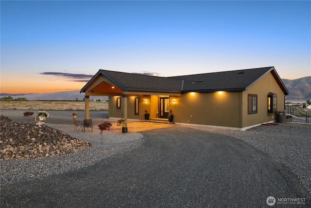 111 Wren Loop SW, Mattawa, WA 99349 - view of front of home with a mountain view and a porch