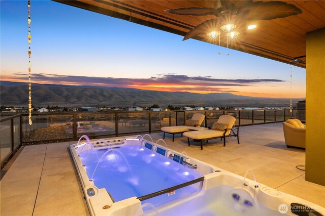 111 Wren Loop SW, Mattawa, WA 99349 - view of pool with an outdoor hot tub, a mountain view, and a patio area