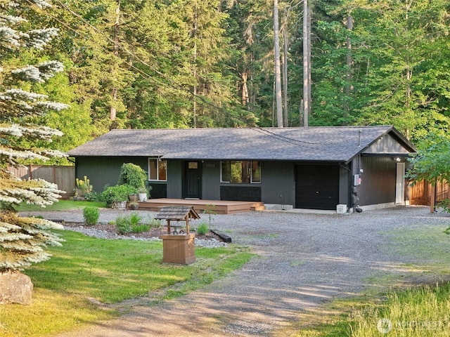 11924 210th St E, Graham, WA 98338 - ranch-style house featuring driveway, covered porch, a shingled roof, and a garage