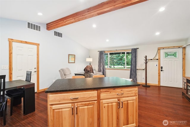 11924 210th St E, Graham, WA 98338 - kitchen featuring dark wood-type flooring, dark countertops, recessed lighting, a kitchen island, and baseboards