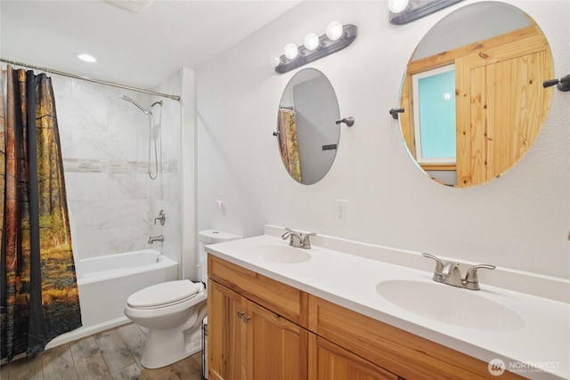 11924 210th St E, Graham, WA 98338 - full bath featuring toilet, double vanity, and shower / tub combo