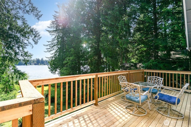 11009E Lake Joy Dr NE, Carnation, WA 98014 - wooden terrace with a water view and outdoor dining area