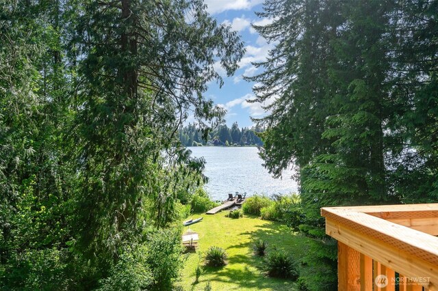 11009E Lake Joy Dr NE, Carnation, WA 98014 - water view with a boat dock and a heavily wooded area