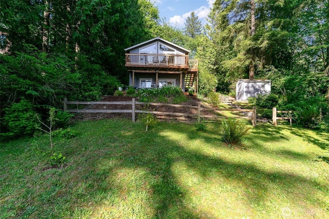 11009E Lake Joy Dr NE, Carnation, WA 98014 - rear view of house featuring a deck, stairway, and a yard