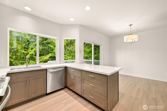 1999 Governor Rd, Bellingham, WA 98229 - kitchen featuring dishwasher, light wood-style flooring, stove, a peninsula, and recessed lighting
